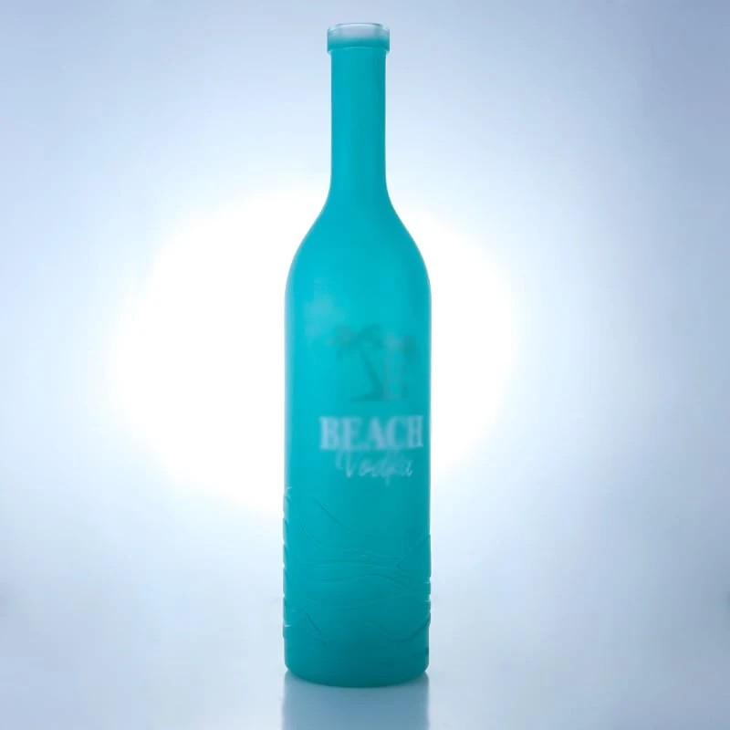 081-Beautifully painted lines in light blue are carved on vodka bottles