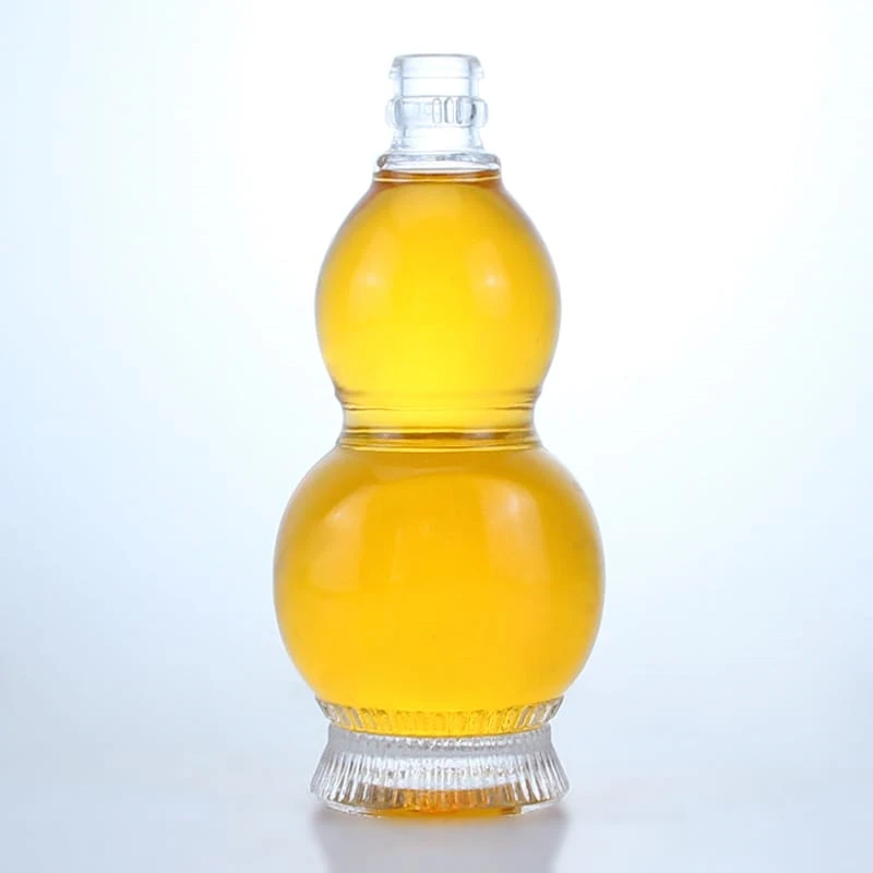 284 - Unique Gourd Shape Flint Glass Bottle With Guala Cap